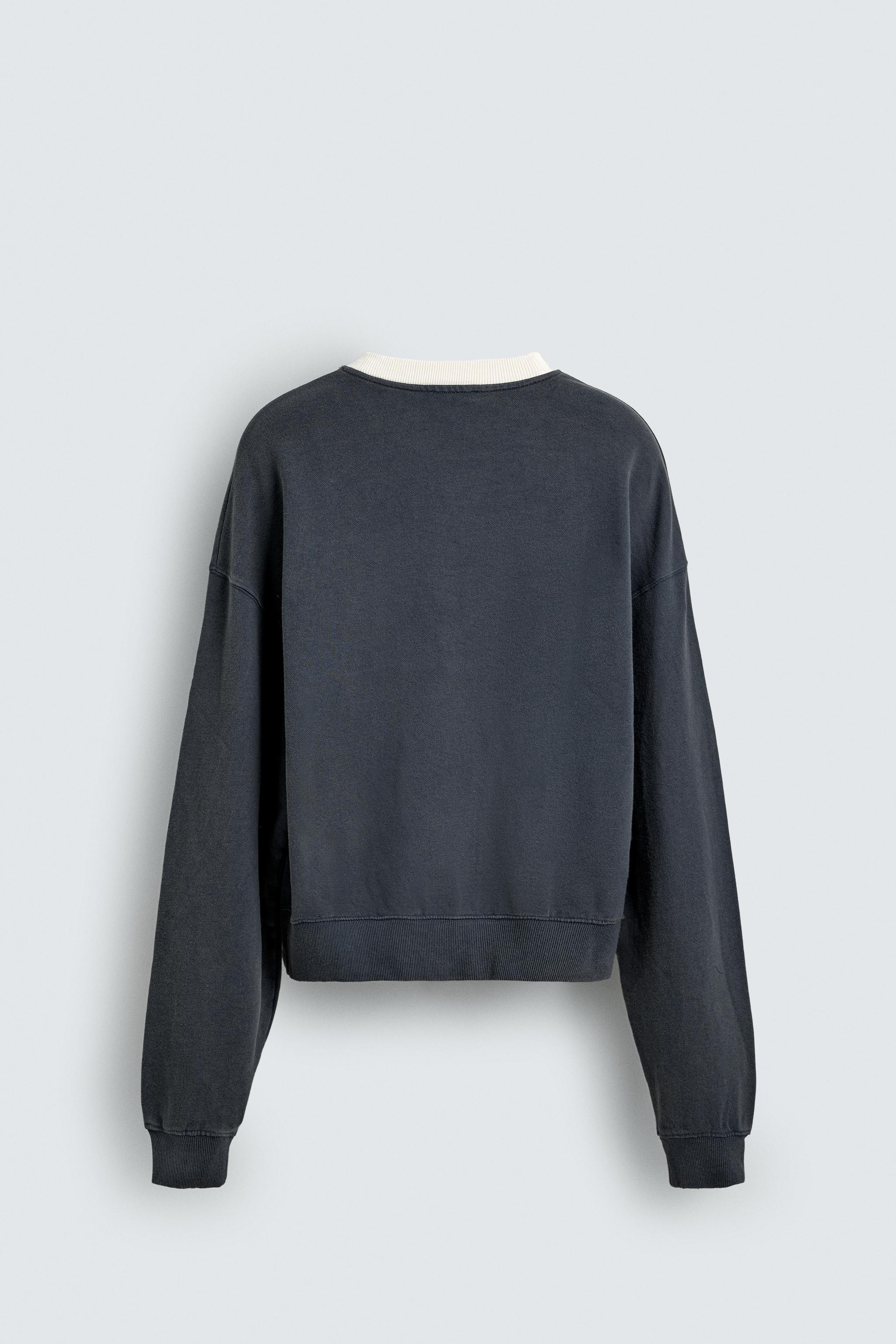 SWEAT AVEC IMPRIMÉ DÉLAVÉ
